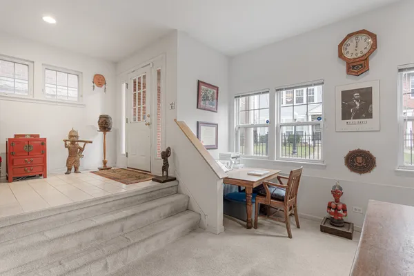 a bedroom with furniture and a window