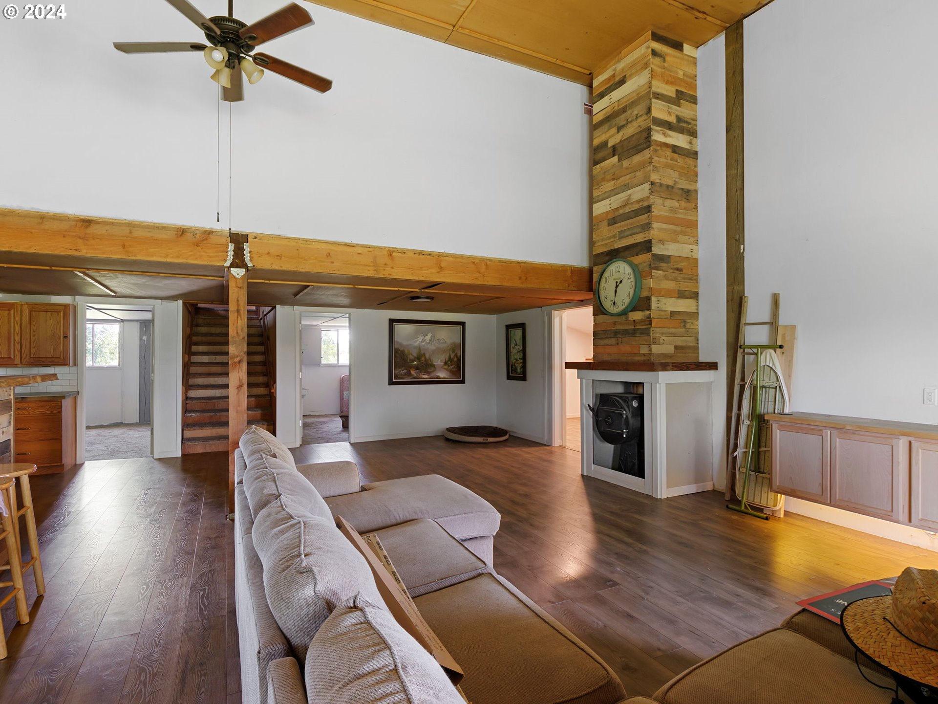 20221 Northeast 22nd Avenue Ridgefield, WA 98642 - Photo 32 of 39 a dinning room with furniture fireplace and wooden floor