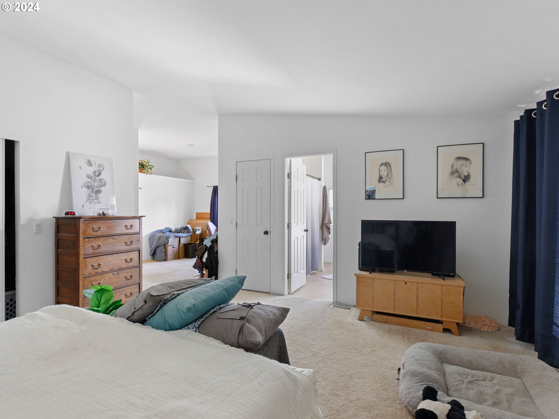 20221 Northeast 22nd Avenue Ridgefield, WA 98642 - Photo 10 of 39 a bedroom with furniture and a couch