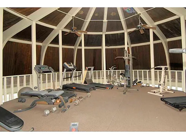 a view of swimming pool with a patio