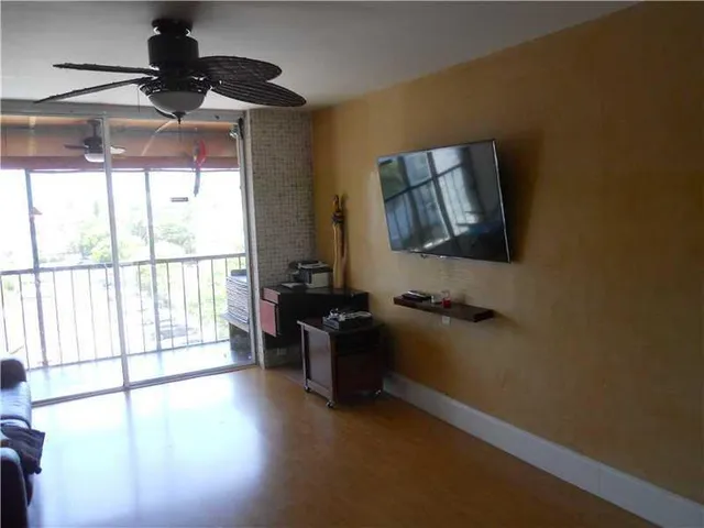 a view of livingroom with furniture and wooden floor