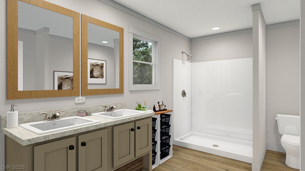 464 Box Canyon Road Alamo, NV 89001 - Photo 3 of 48 Clean lines and a spacious double vanity define this modern bathroom space.