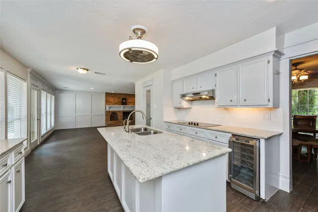 a kitchen with a stove and cabinets
