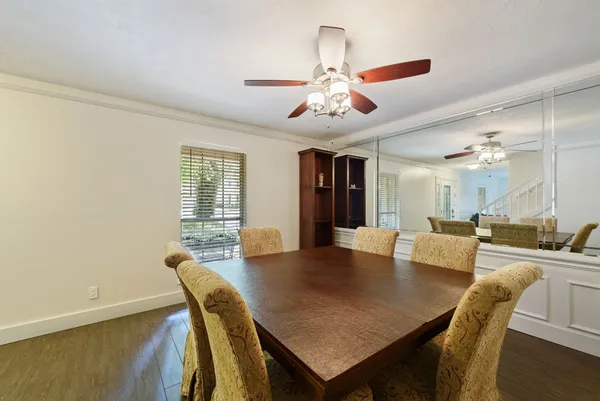 a view of a dining room with furniture