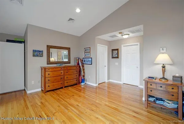 a bedroom with a bed and furniture