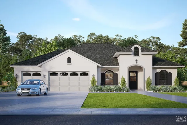 a view of a white house with a yard and parking space