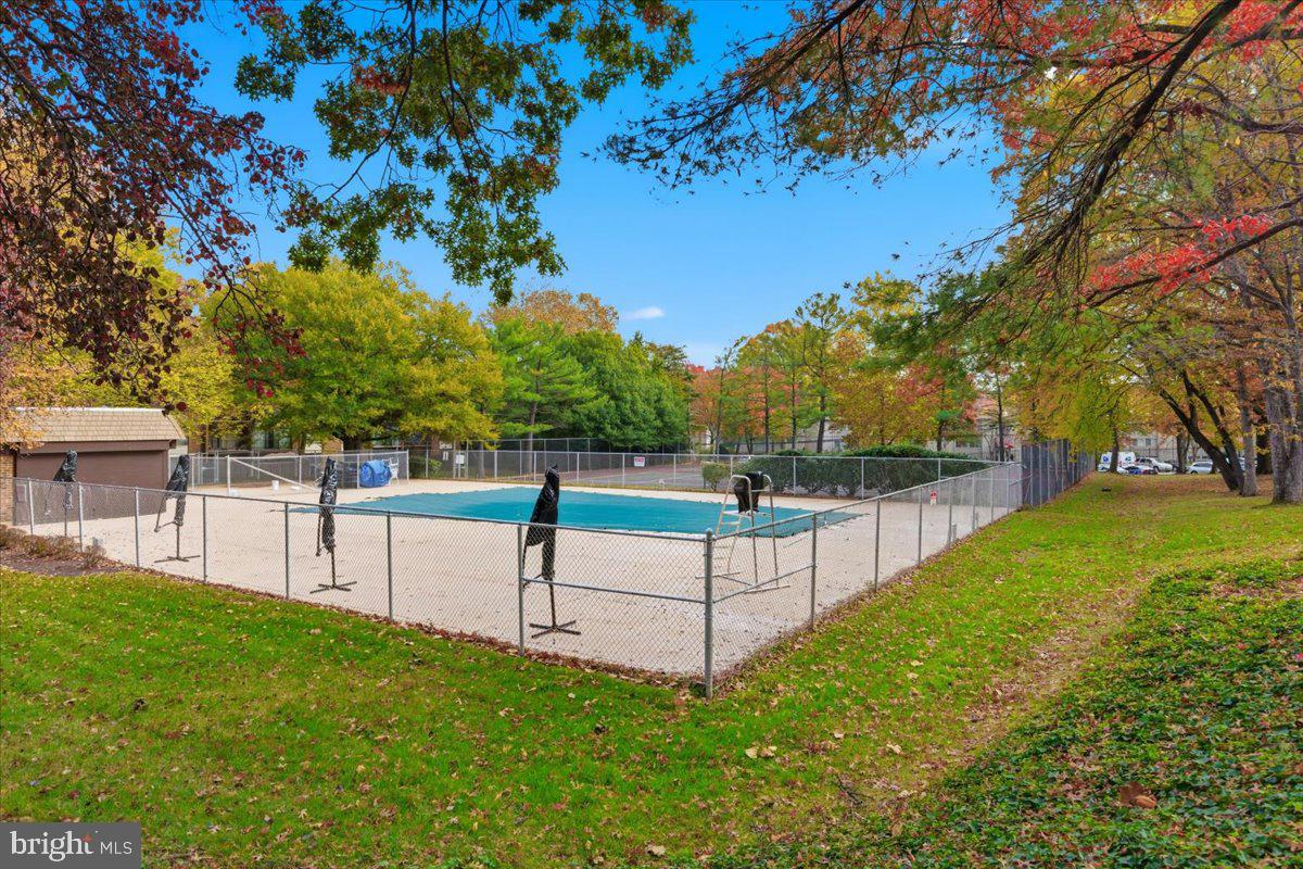 8459 Greenbelt Road, Unit T1 Greenbelt, MD 20770 - Photo 24 of 27 a view of backyard with green space