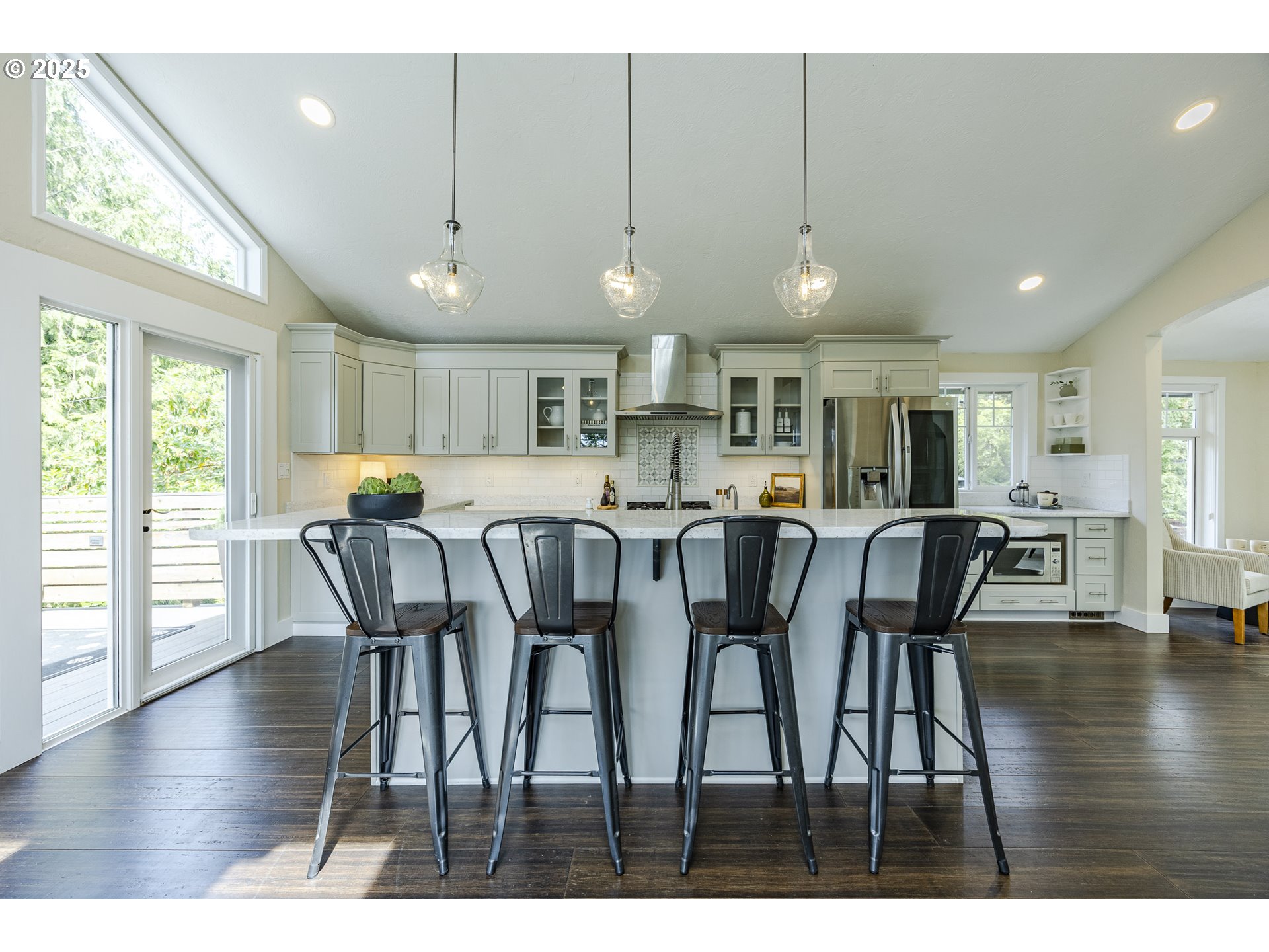 32518 Dillard Road Eugene, OR 97405 - Photo 13 of 45 a open kitchen with stainless steel appliances granite countertop a dining table chairs and white cabinets