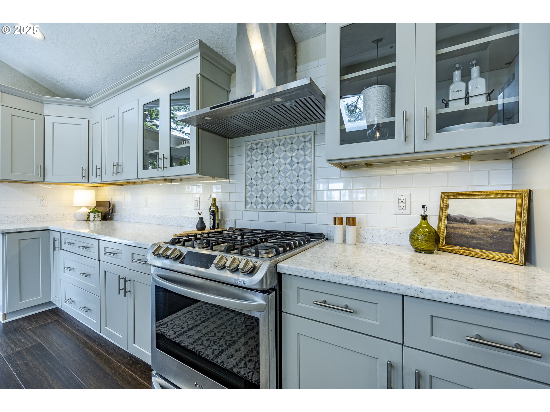 32518 Dillard Road Eugene, OR 97405 - Photo 14 of 45 a kitchen with stainless steel appliances granite countertop a stove a sink and a microwave