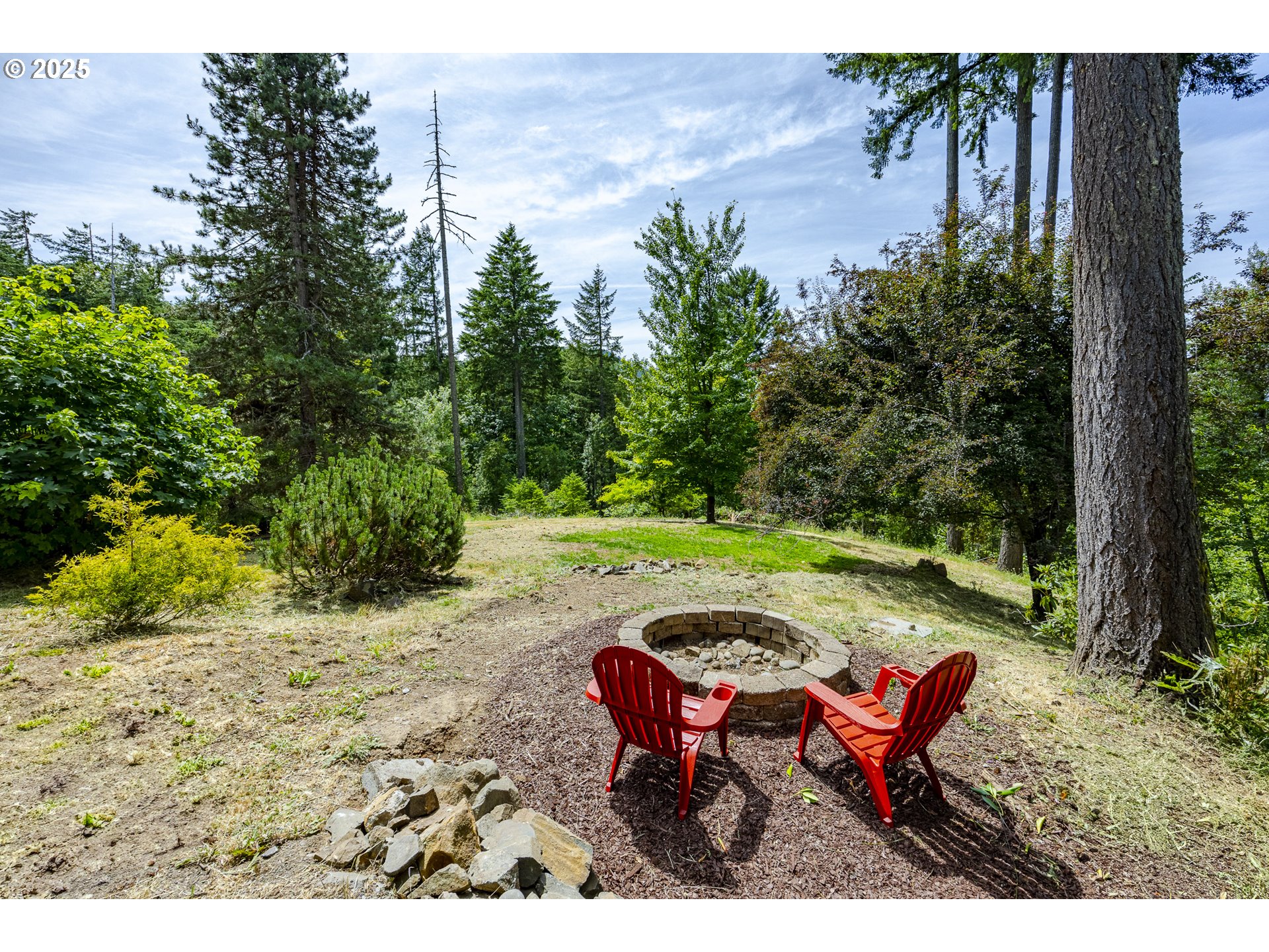 32518 Dillard Road Eugene, OR 97405 - Photo 16 of 45 a view of a chairs and table in the garden