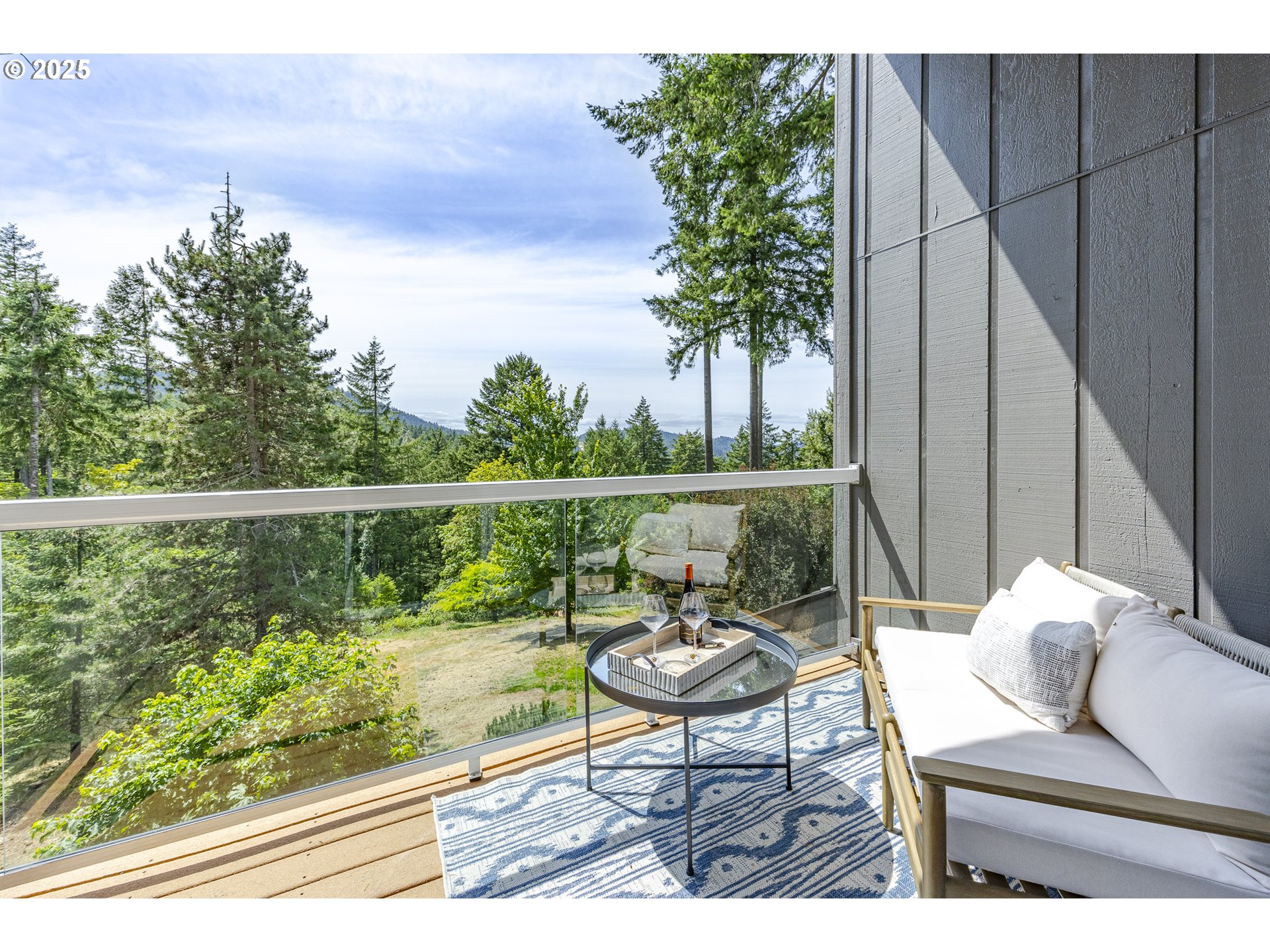 32518 Dillard Road Eugene, OR 97405 - Photo 23 of 45 a balcony with furniture and a potted plant