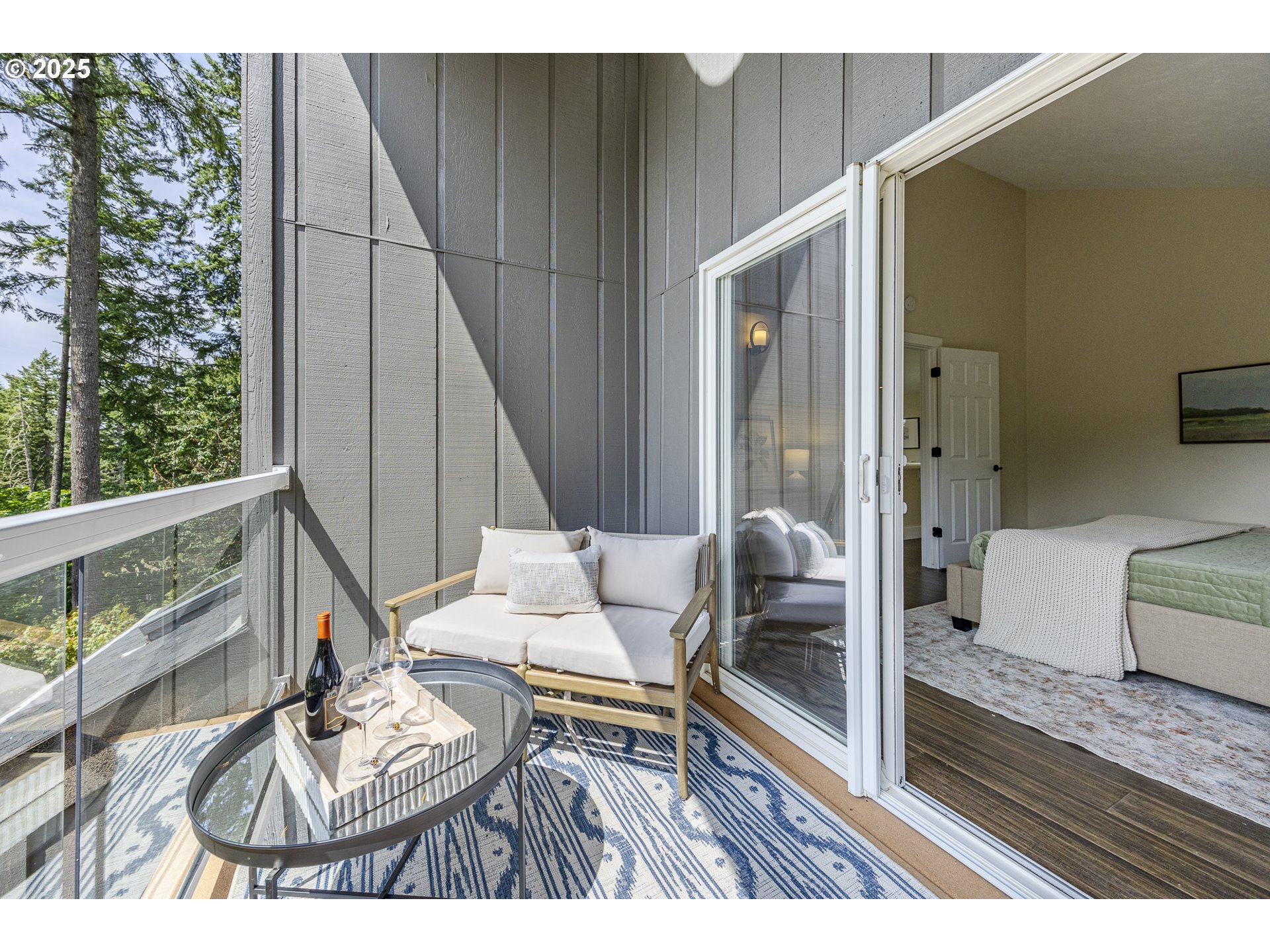 32518 Dillard Road Eugene, OR 97405 - Photo 24 of 45 a balcony with furniture and a potted plant