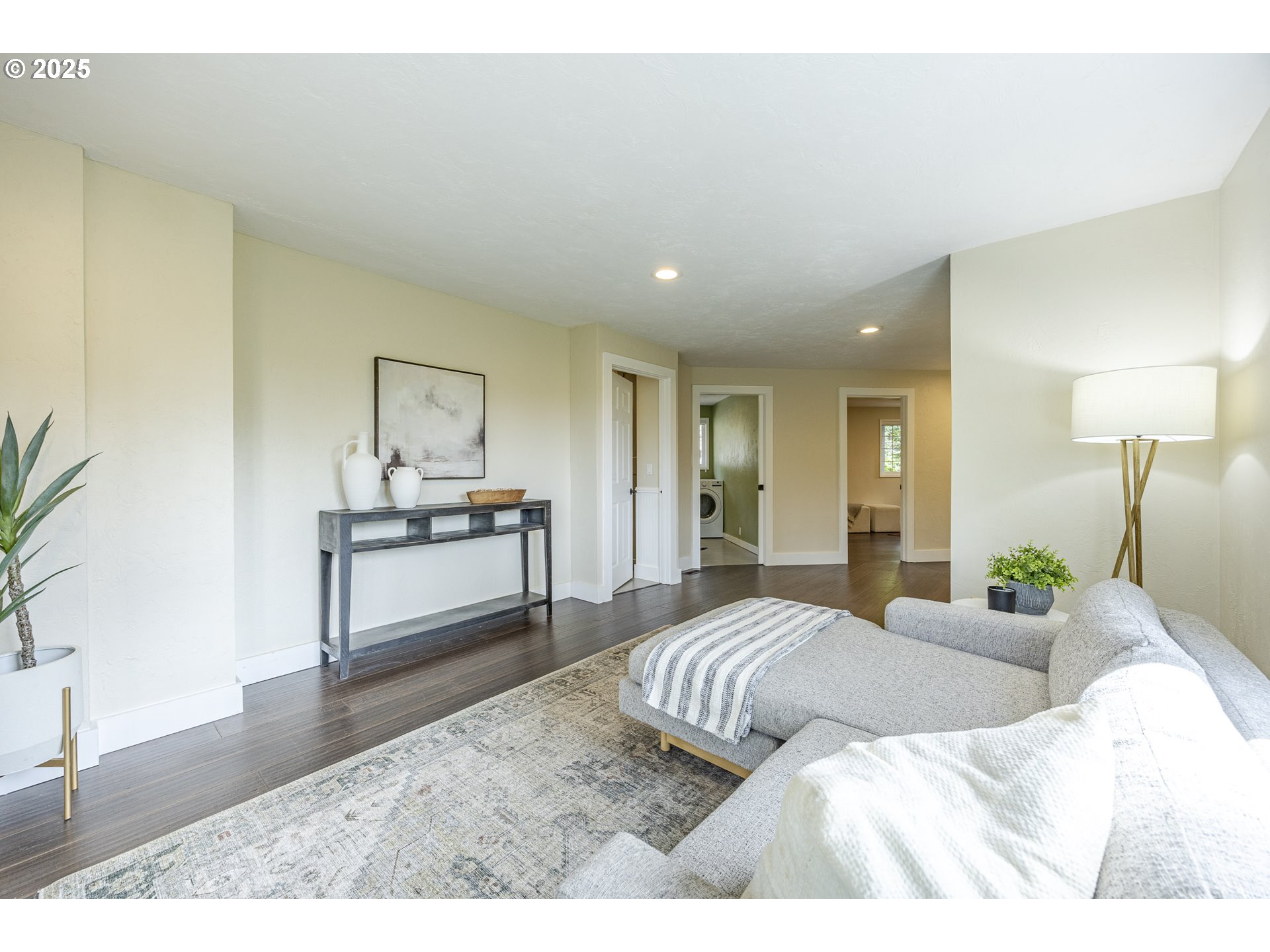 32518 Dillard Road Eugene, OR 97405 - Photo 30 of 45 a bedroom with a bed and a potted plant on the dresser