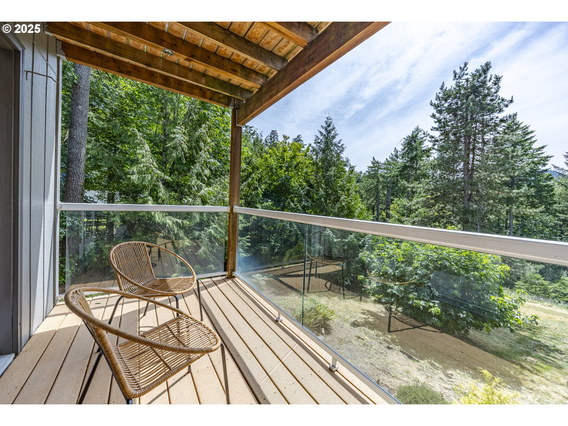 32518 Dillard Road Eugene, OR 97405 - Photo 35 of 45 a view of a balcony with wooden floor and fence