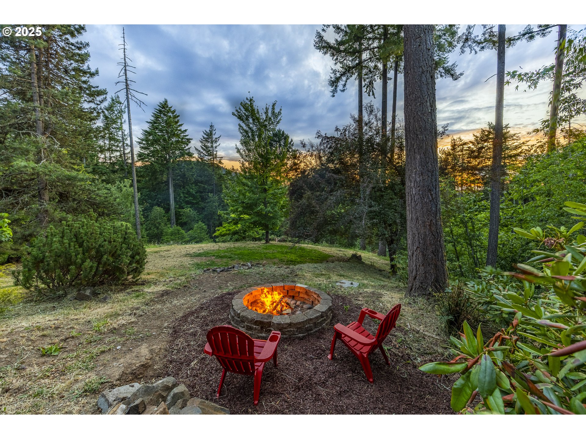 32518 Dillard Road Eugene, OR 97405 - Photo 41 of 45 a wooden bench sitting in the middle of a forest