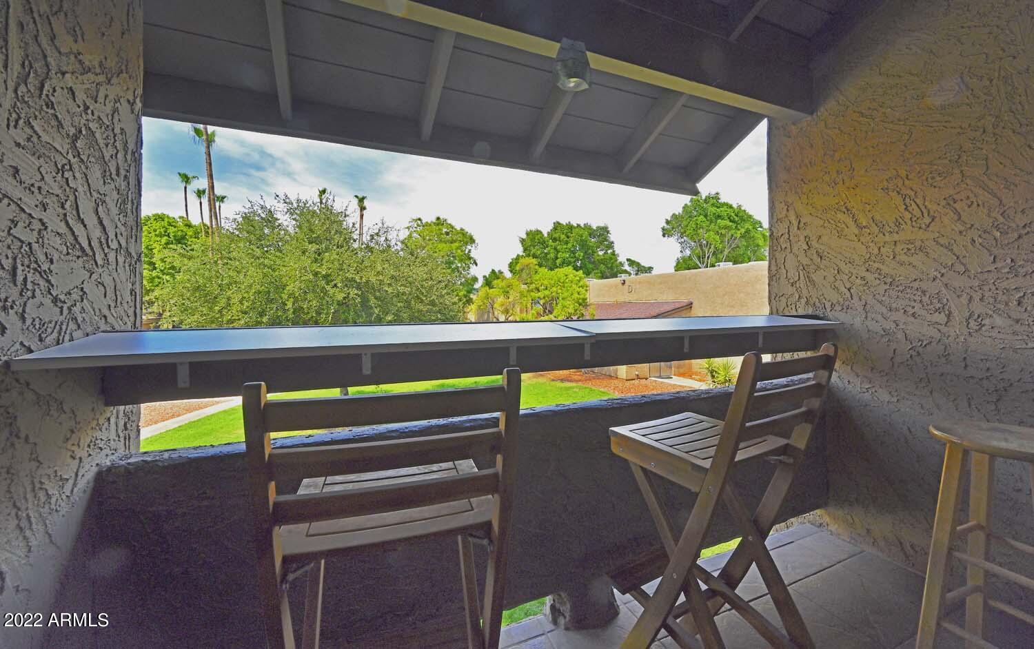 3825 East Camelback Road, Unit 243 Phoenix, AZ 85018 - Photo 13 of 20 Balcony with Bar