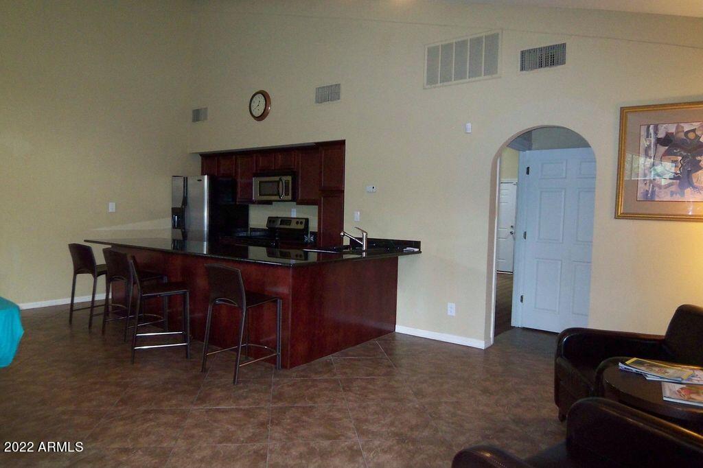 3825 East Camelback Road, Unit 243 Phoenix, AZ 85018 - Photo 18 of 20 Clubhouse Kitchen