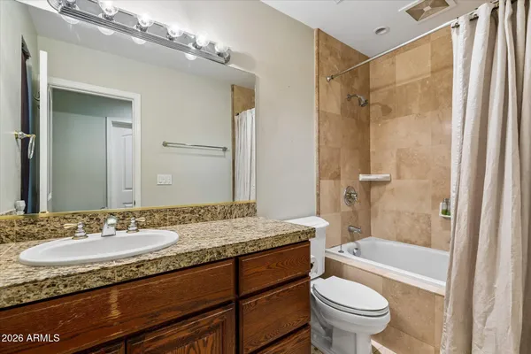 a view of a patio with table and chairs potted plants
