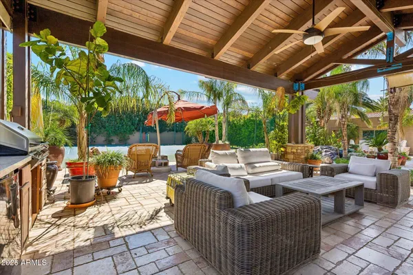 a view of a swimming pool with a patio