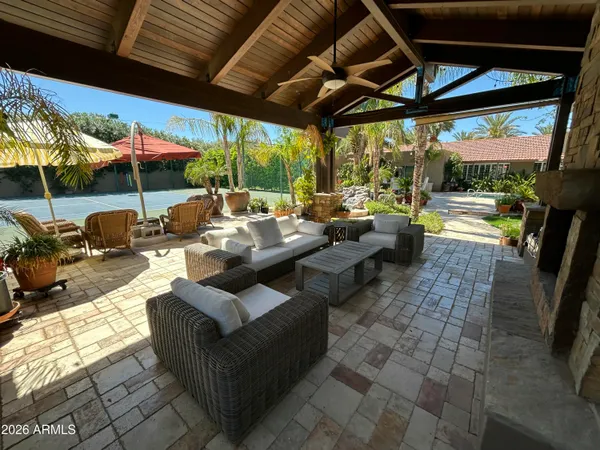 a view of a swimming pool with a patio
