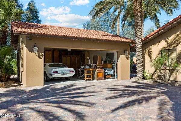 a view of a backyard with a patio