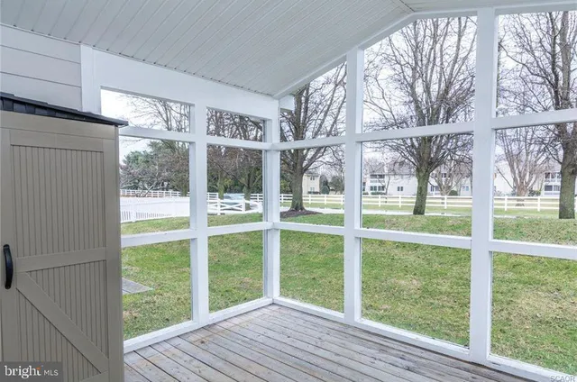 a view of a room with windows