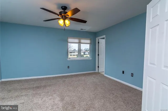 a view of an empty room with window