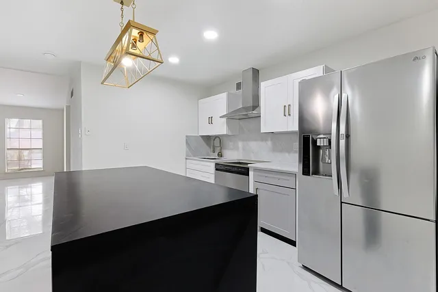 a view of a livingroom with a bathroom
