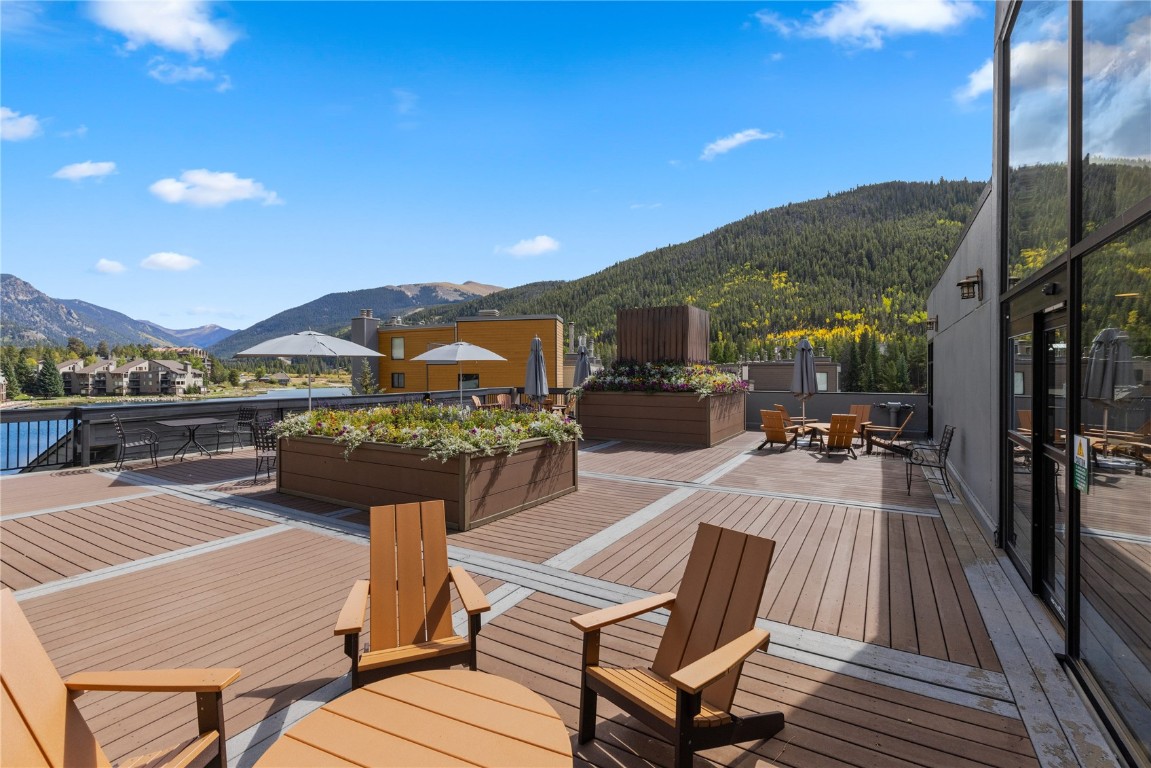 35 Argentine Court, Unit 202 Keystone, CO 80435 - Photo 20 of 34 a view of a terrace with furniture and a floor to ceiling window