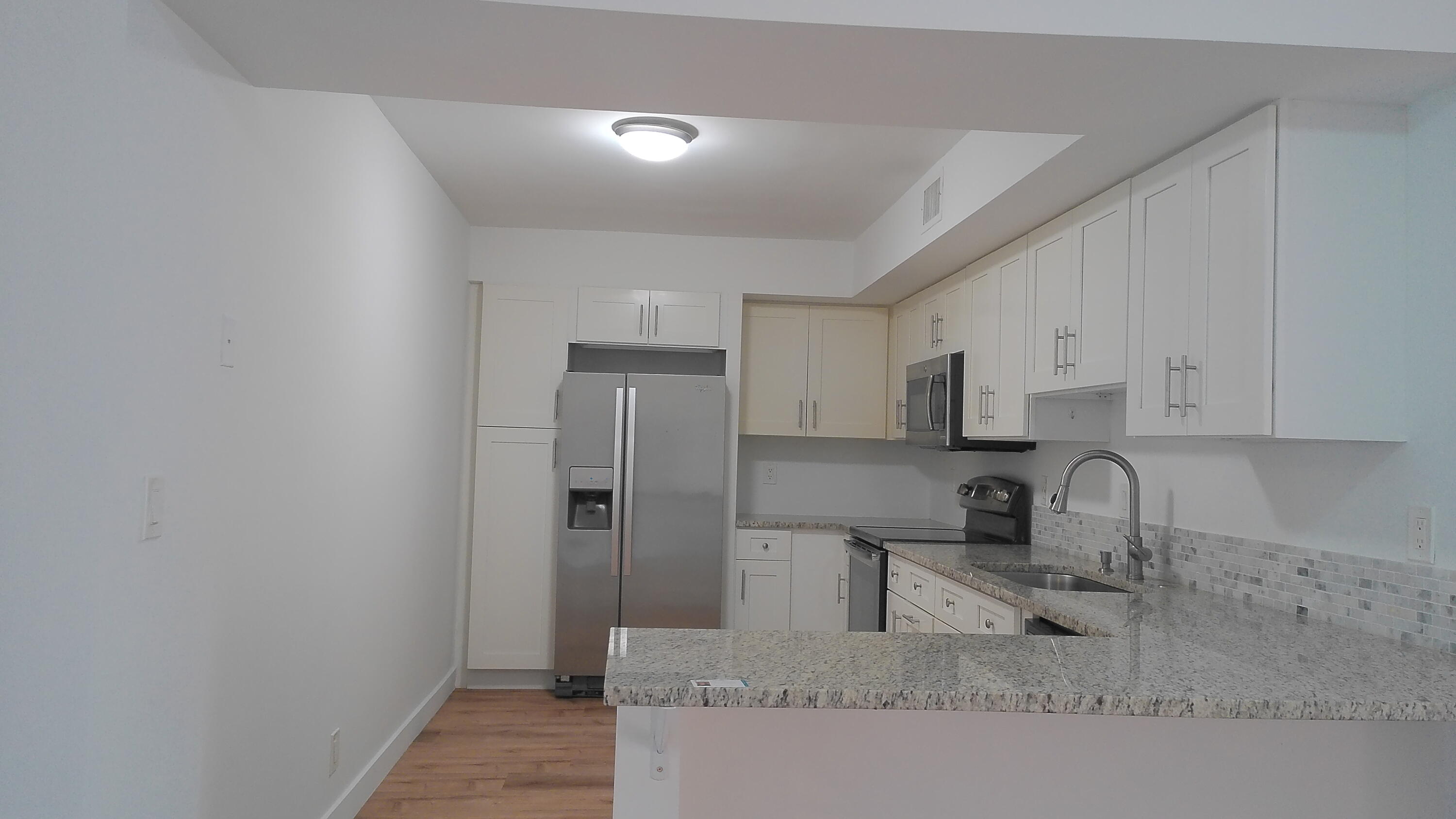 3180 Leewood Terrace, Unit L108 Boca Raton, FL 33431 - Photo 6 of 23 Kitchen
