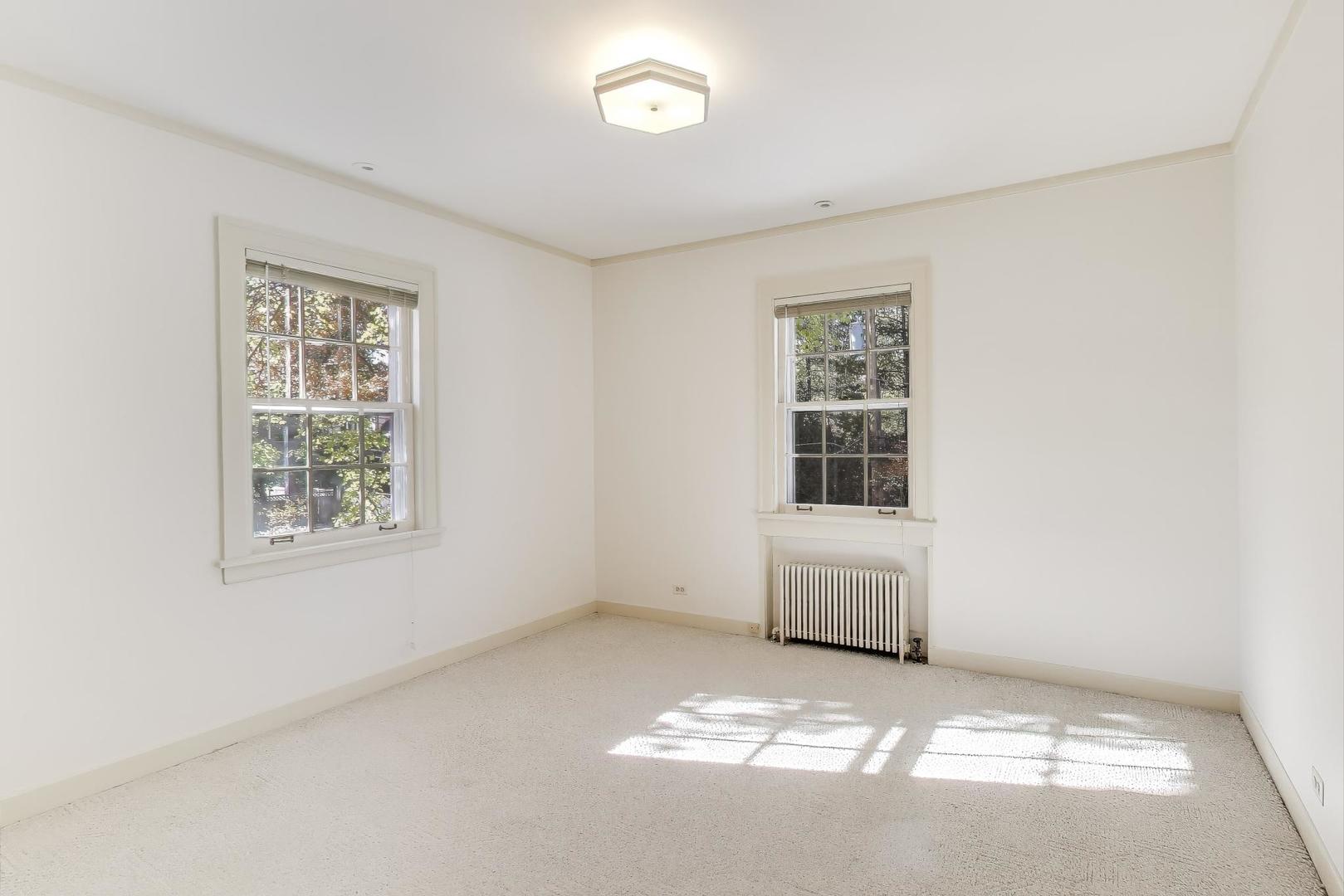 1227 16th Street Wilmette, IL 60091 - Photo 11 of 22 a view of an empty room with a window