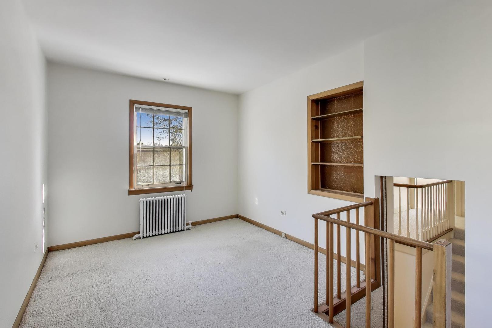 1227 16th Street Wilmette, IL 60091 - Photo 16 of 22 an empty room with windows