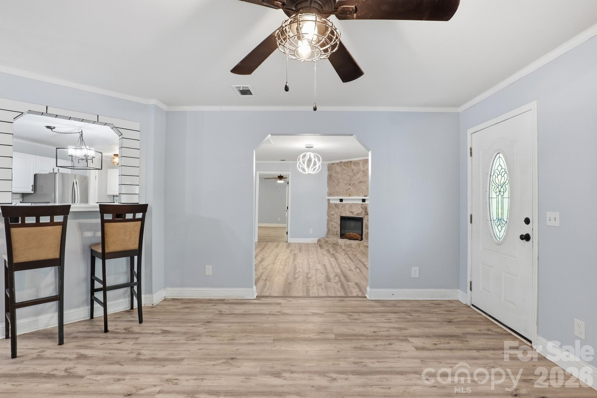 116 Springdale Drive York, SC 29745 - Photo 12 of 32 a view of a livingroom with furniture and chandelier fan