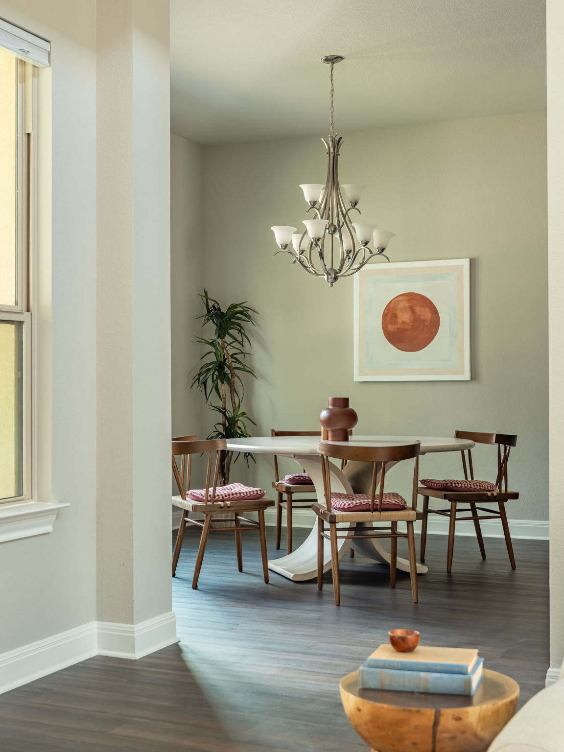 2516 Hopsack Mills Road Austin, TX 78748 - Photo 35 of 39 Dining area featuring dark wood-finish flooring, light neutral wall paint, and a multi-arm chandelier with white glass shades