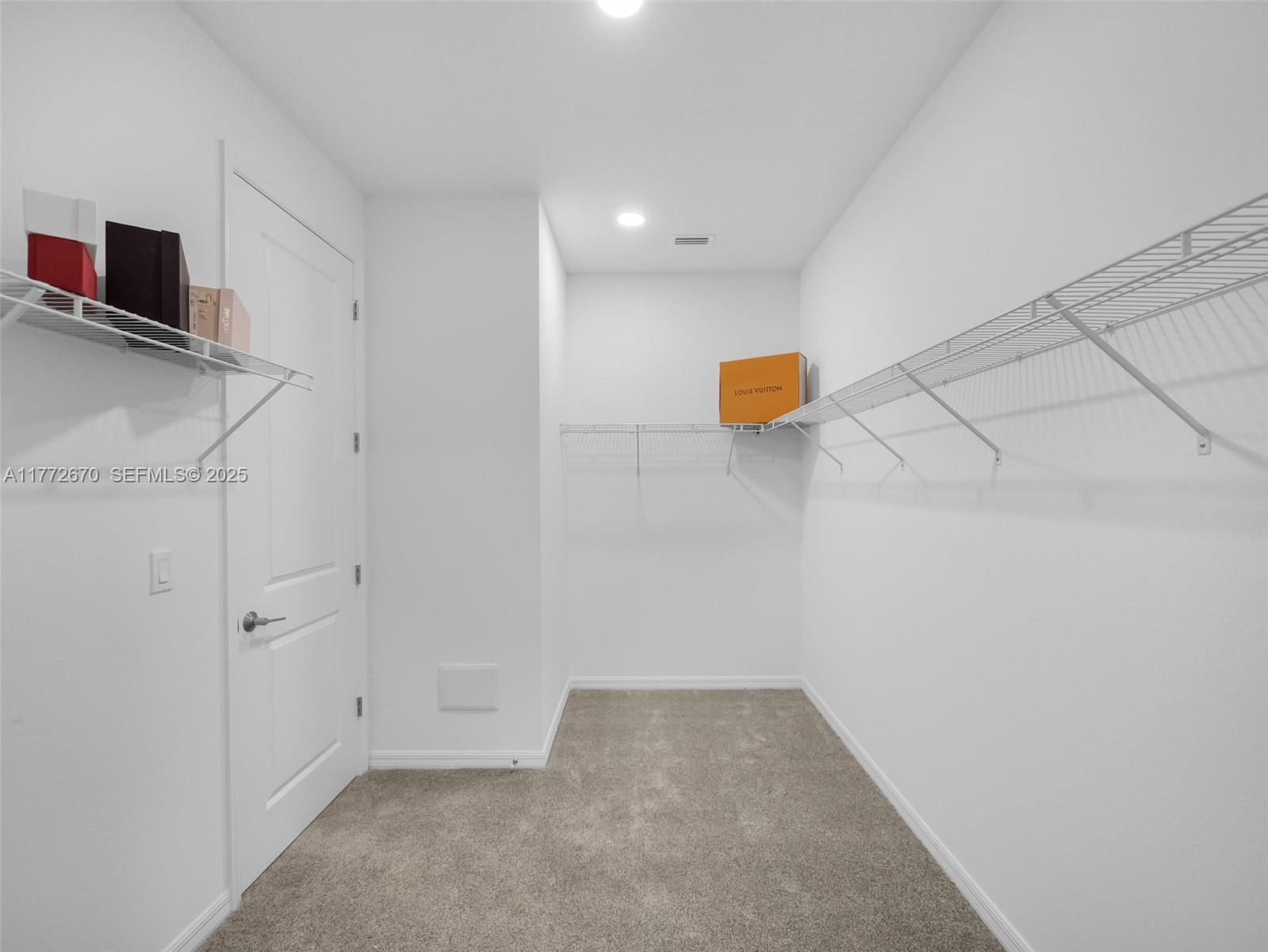 516 Ranch Oak Circle Port St. Lucie, FL 34984 - Photo 12 of 44 a view of a storage & utility room with a sink