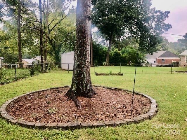 6334 Beecher Drive Charlotte, NC 28215 - Photo 27 of 27 a view of a park with a tree