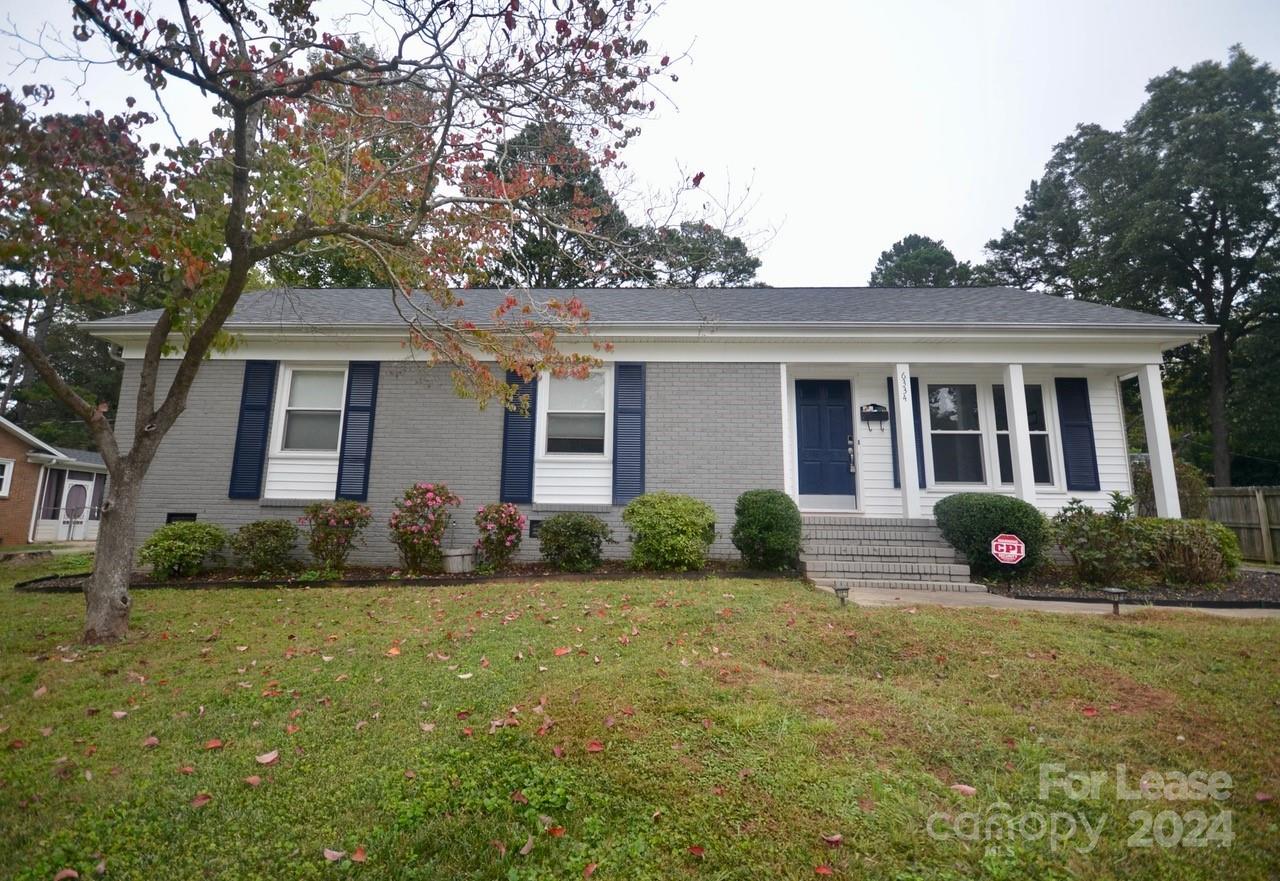 6334 Beecher Drive Charlotte, NC 28215 - Photo 3 of 27 a front view of house with yard and green space