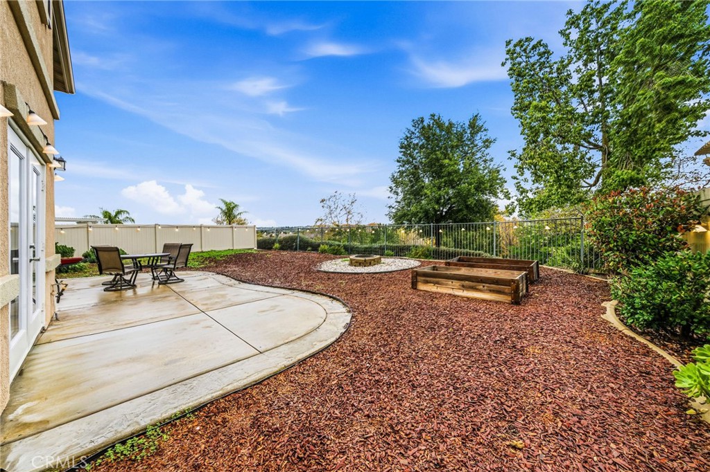 33656 Winston Way, Unit A Temecula, CA 92592 - Photo 31 of 46 a view of a swimming pool with outdoor seating and plants