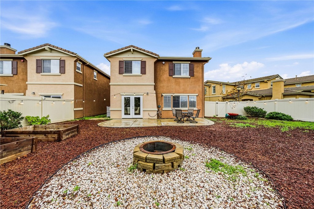 33656 Winston Way, Unit A Temecula, CA 92592 - Photo 34 of 46 a front view of a house with a yard