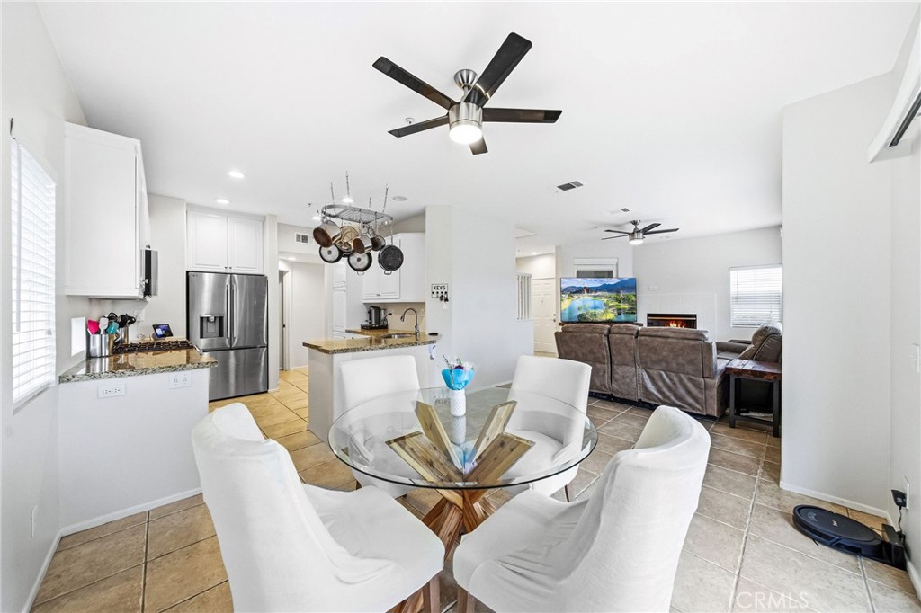 33656 Winston Way, Unit A Temecula, CA 92592 - Photo 4 of 46 a view of a dining room with furniture