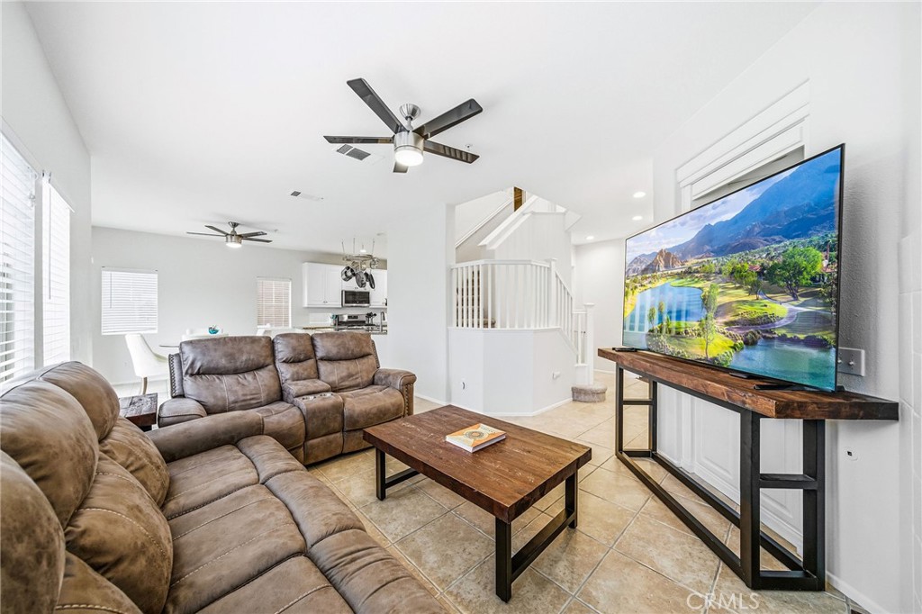 33656 Winston Way, Unit A Temecula, CA 92592 - Photo 9 of 46 a living room with furniture and a flat screen tv