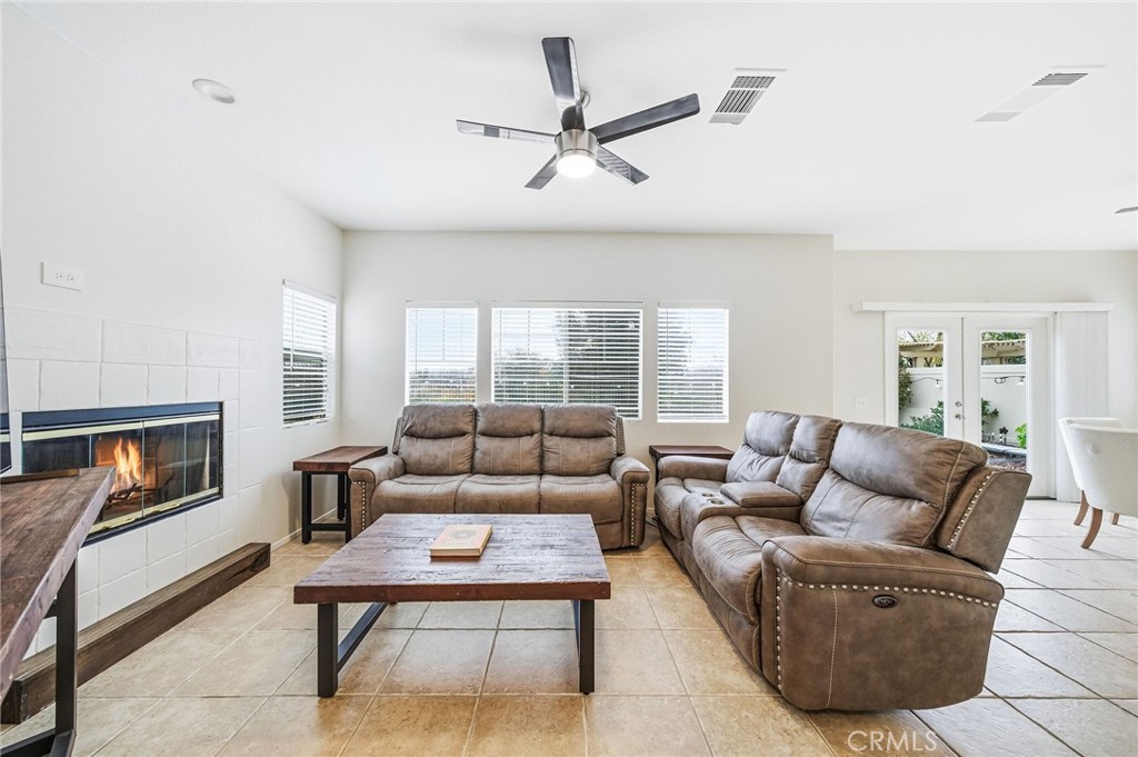 33656 Winston Way, Unit A Temecula, CA 92592 - Photo 10 of 46 a living room with furniture a table and a window