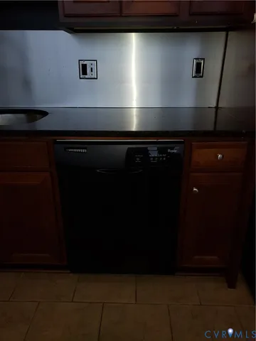 a view of a refrigerator in kitchen