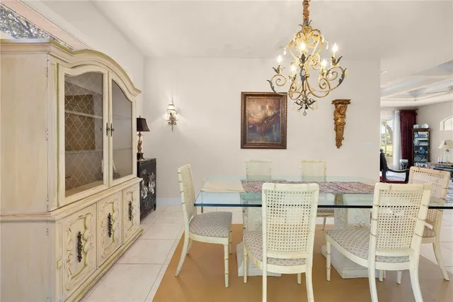 a spacious bedroom with a bed couch and a window