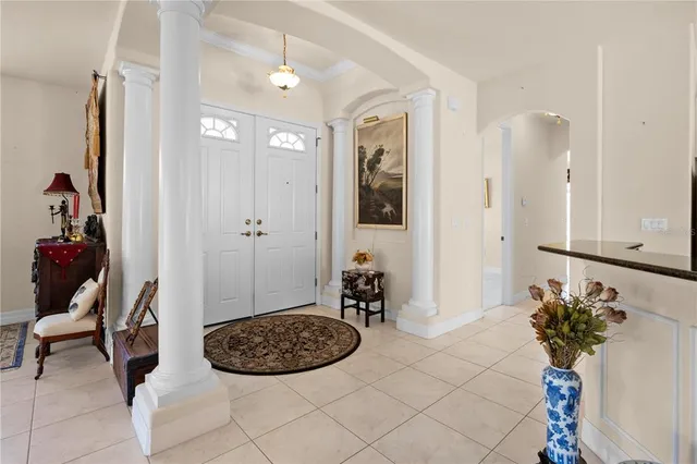 a view of a livingroom with furniture and entryway