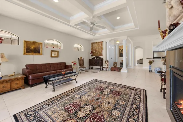 a living room with furniture and a rug