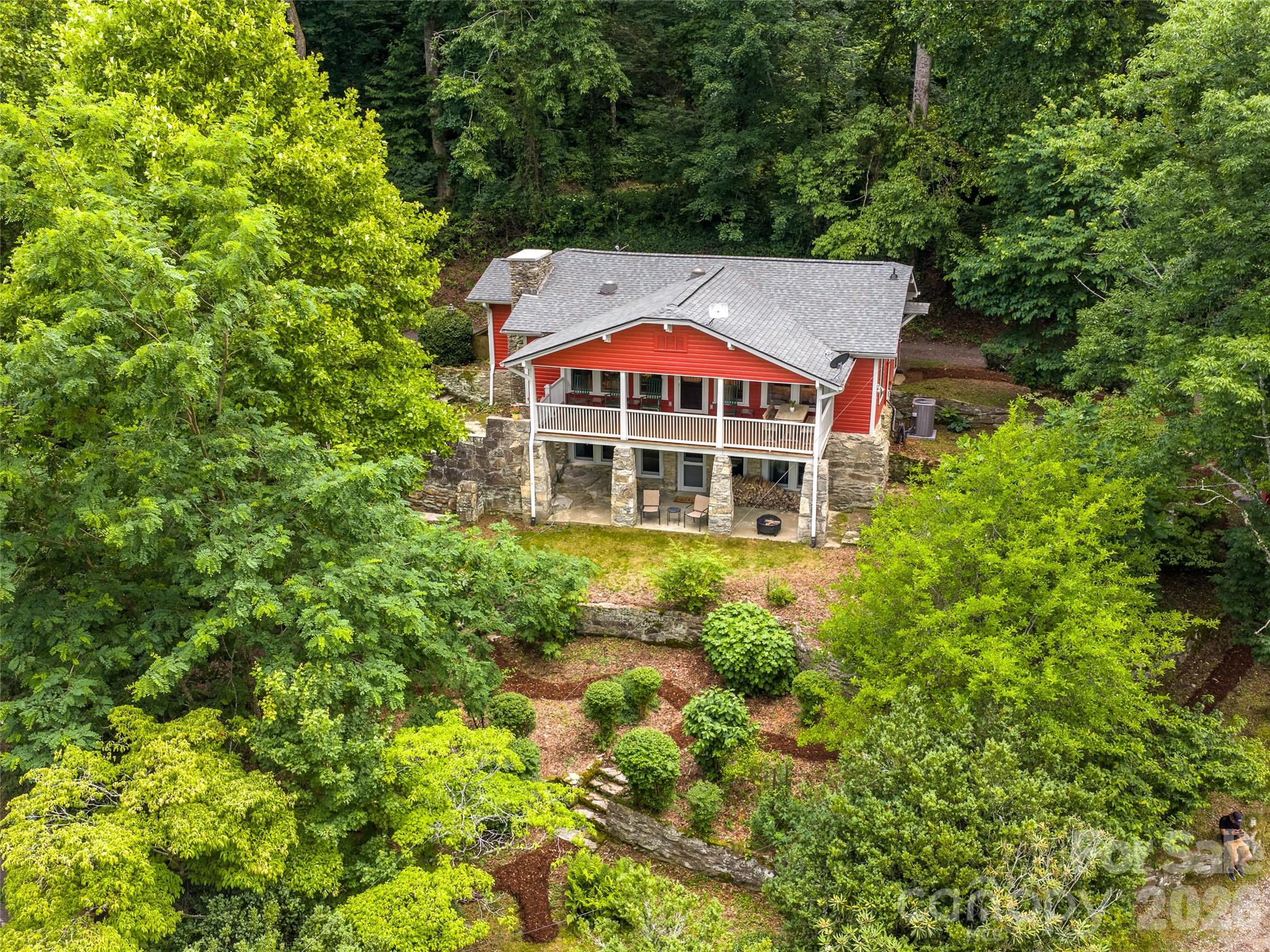 206 Chestnut Hill Road Gerton, NC 28735 - Photo 2 of 48 a outdoor view of a house with a yard