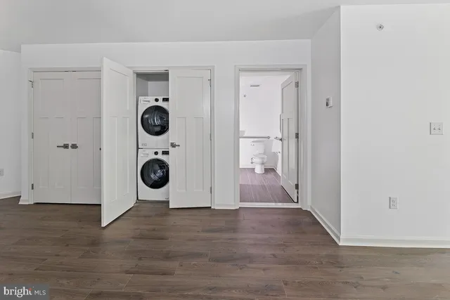 a view of a storage & utility room with washer and dryer