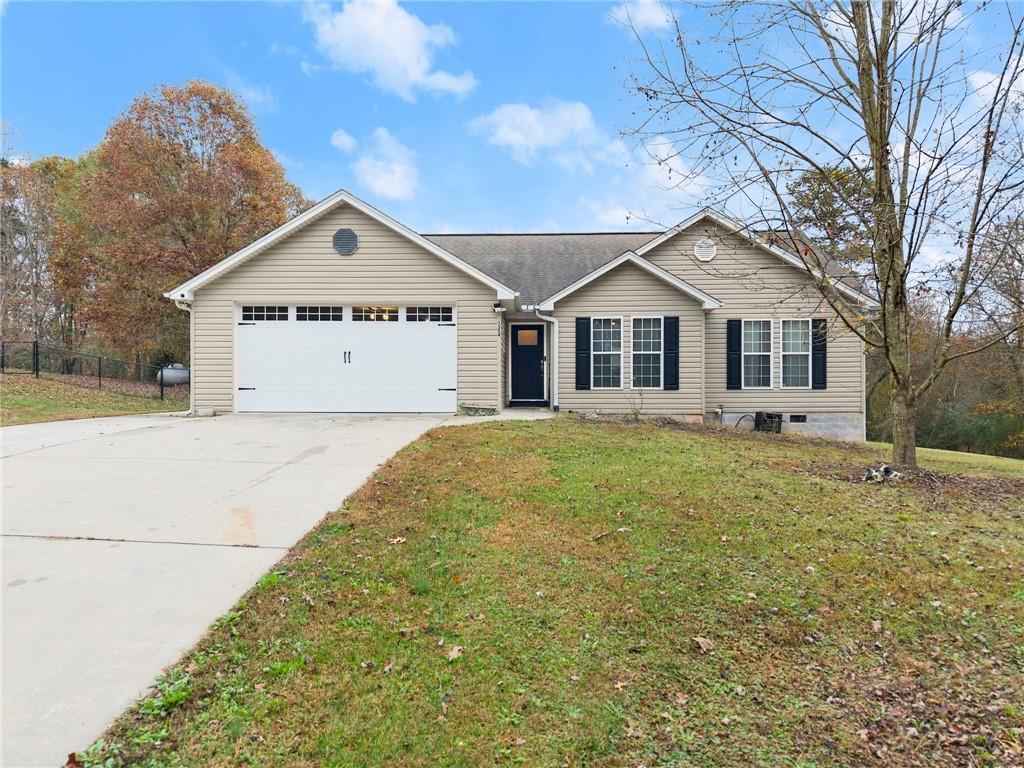 1354 Bill Presley Road Cleveland, GA 30528 - Photo 1 of 1 a front view of a house with a yard
