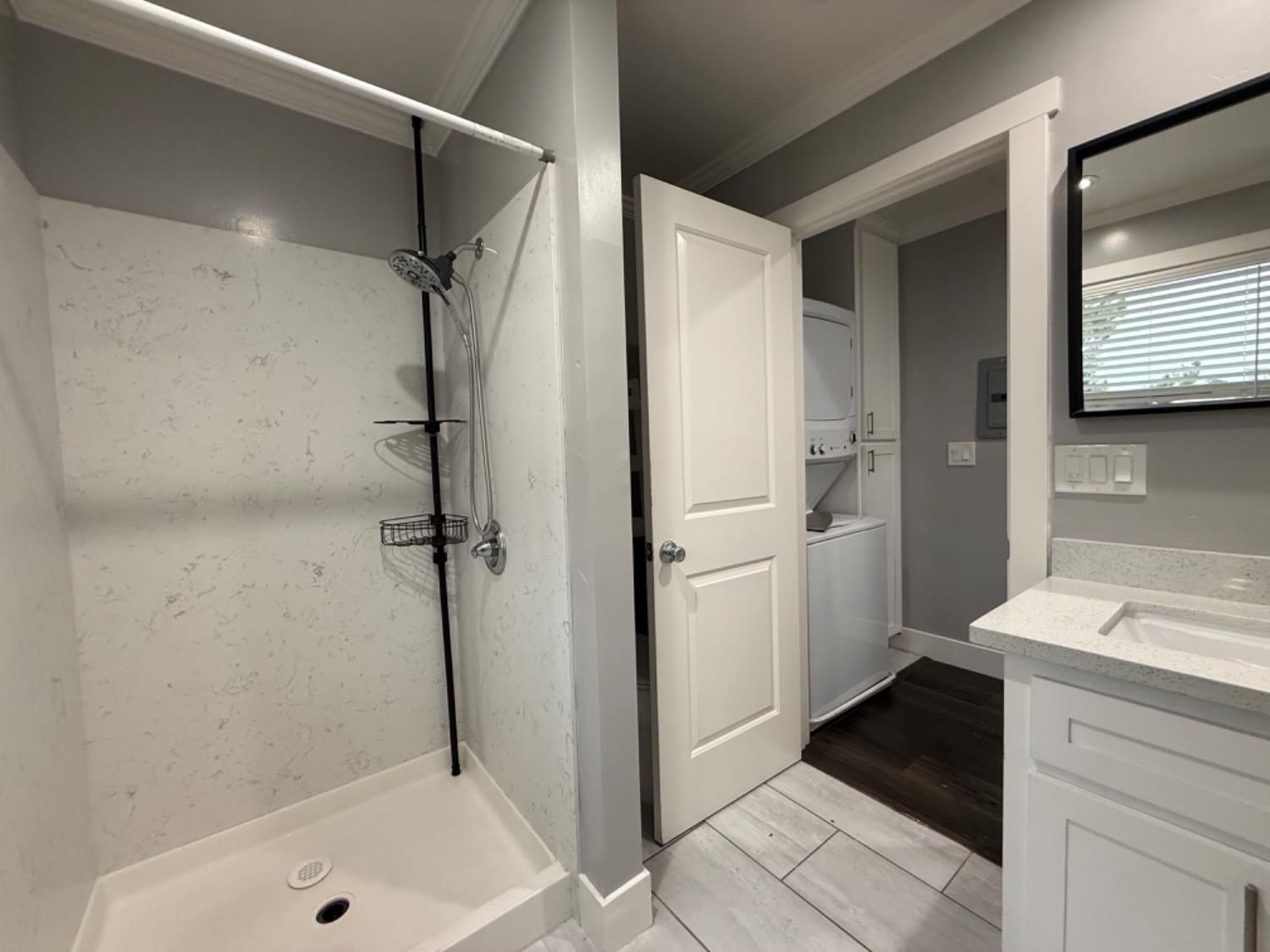 3315 Moonshine Alley Sacramento, CA 95817 - Photo 3 of 4 a bathroom with a shower and a sink